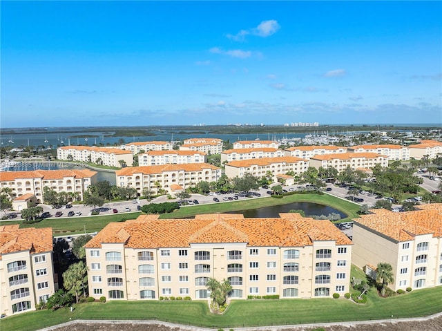 drone / aerial view featuring a water view