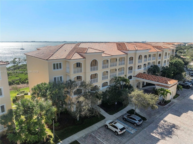 view of building exterior featuring a water view