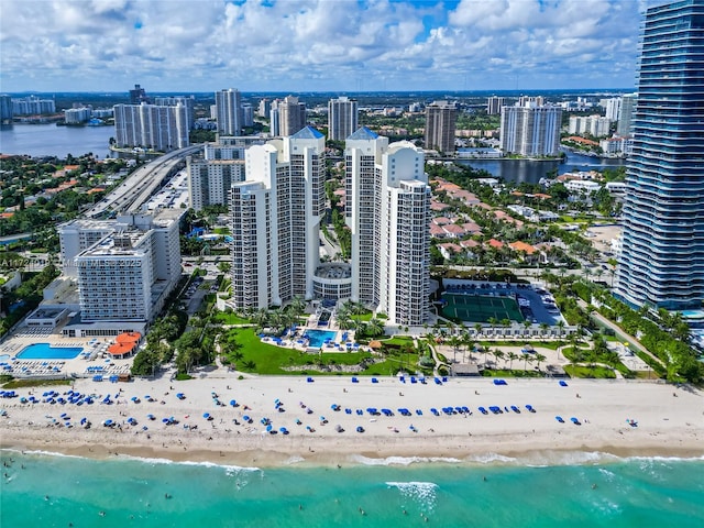 aerial view featuring a water view and a view of the beach