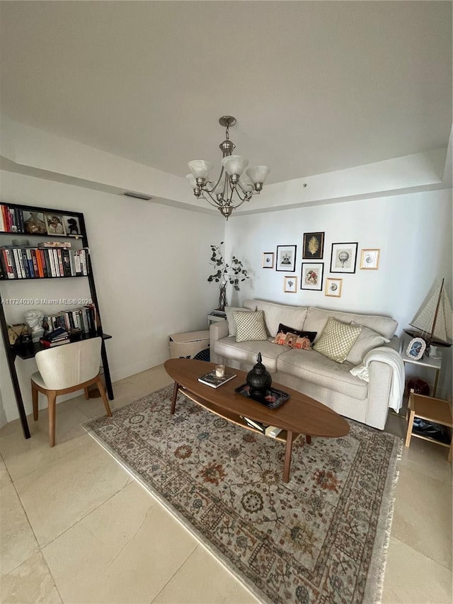 living room with an inviting chandelier