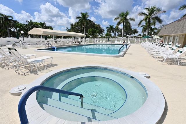 view of swimming pool featuring a patio area