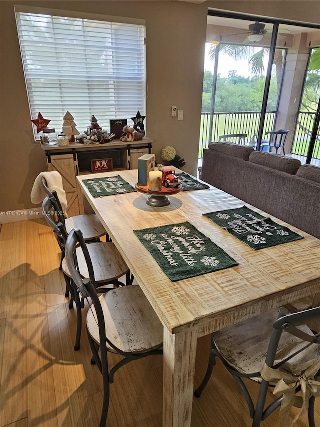 dining area featuring hardwood / wood-style flooring