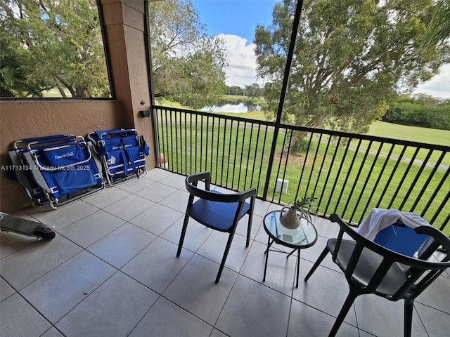 balcony featuring a water view