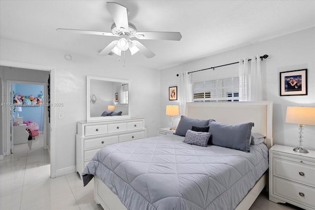 bedroom with light tile patterned floors and ceiling fan