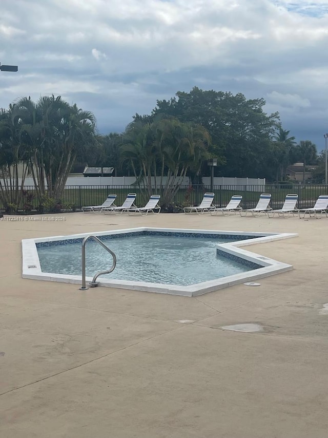 view of pool with a patio