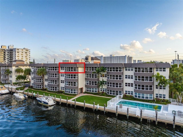 view of property with a water view