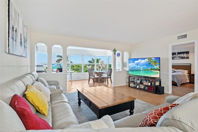 living room featuring light tile patterned flooring