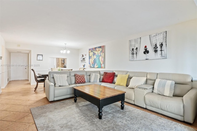 tiled living room with an inviting chandelier