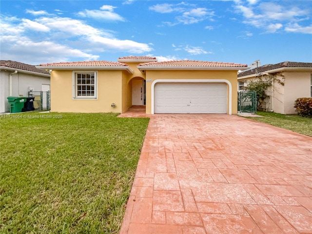 view of front of property featuring a front yard and a garage