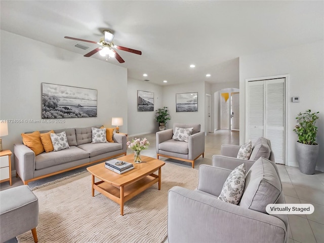 living room with ceiling fan