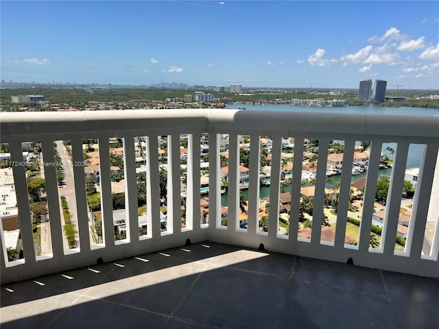 balcony featuring a water view