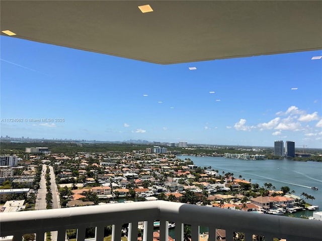 balcony featuring a water view