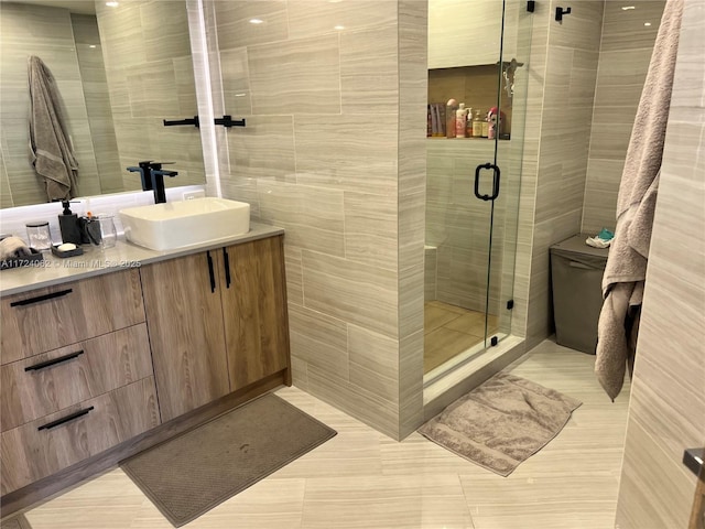 bathroom with vanity and an enclosed shower