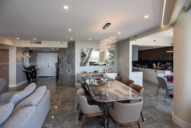 dining room with a chandelier