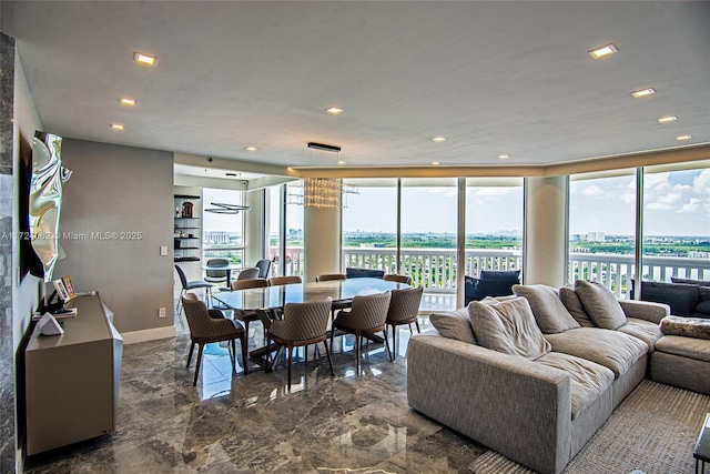 living room with a wall of windows