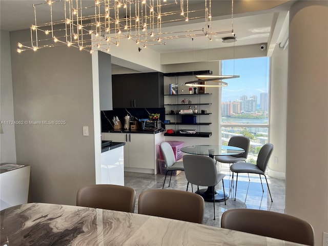 dining space with a healthy amount of sunlight