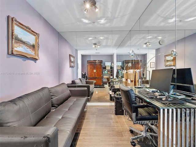 home office featuring light hardwood / wood-style floors