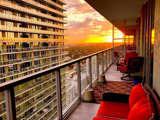 view of balcony at dusk