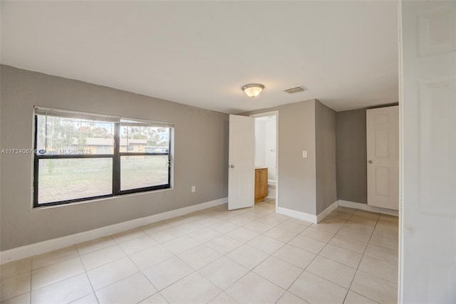 view of tiled empty room