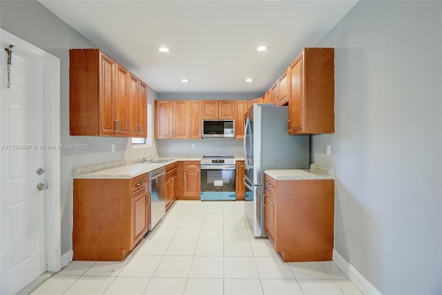 kitchen featuring appliances with stainless steel finishes and sink