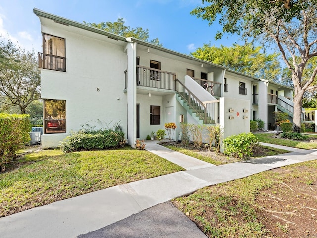 view of property with central AC unit