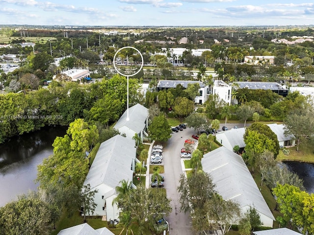 drone / aerial view with a water view