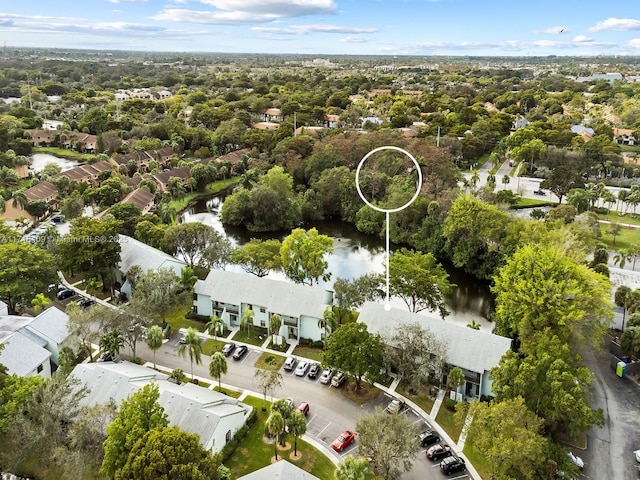 bird's eye view with a water view