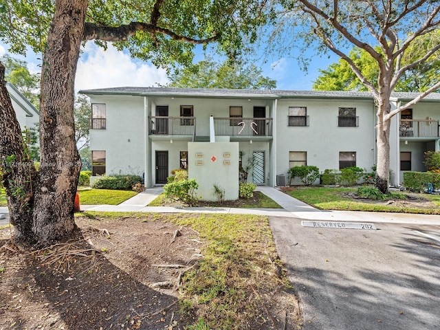 view of front of property featuring central AC unit