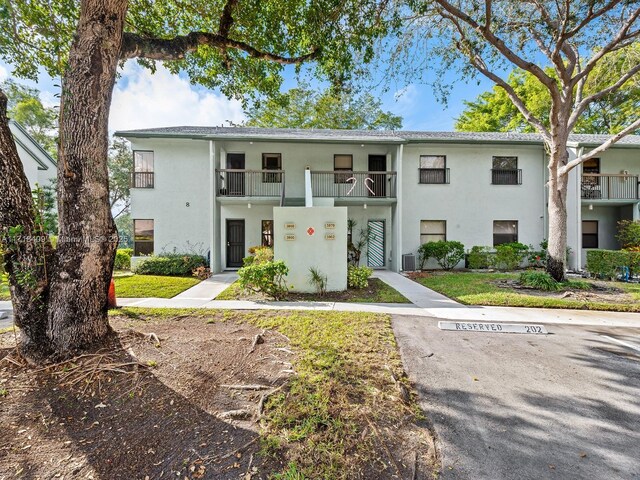 3868 N Carambola Cir N Unit 2961, Coconut Creek, FL 33066 - view of building exterior with central AC unit