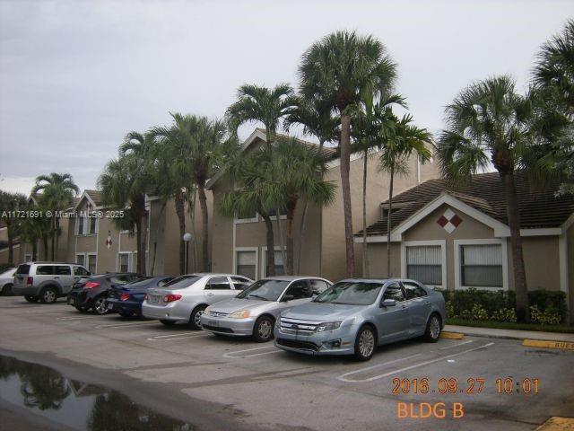 view of parking / parking lot