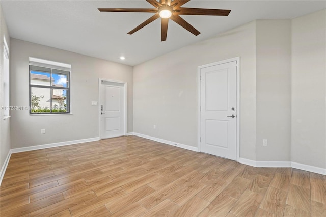 unfurnished room with light hardwood / wood-style flooring and ceiling fan