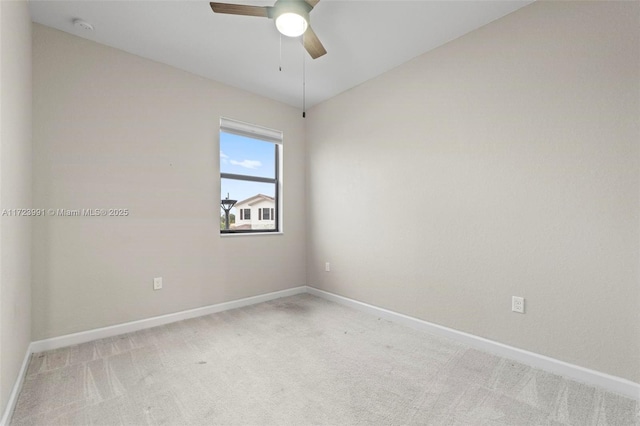 empty room with carpet flooring and ceiling fan