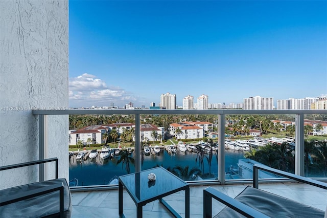 balcony featuring a water view