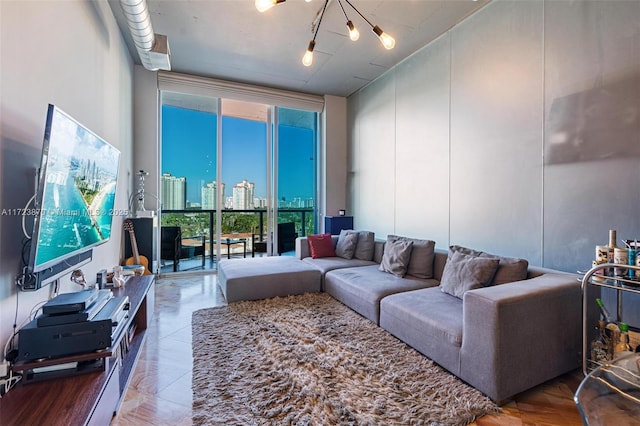 living room featuring floor to ceiling windows