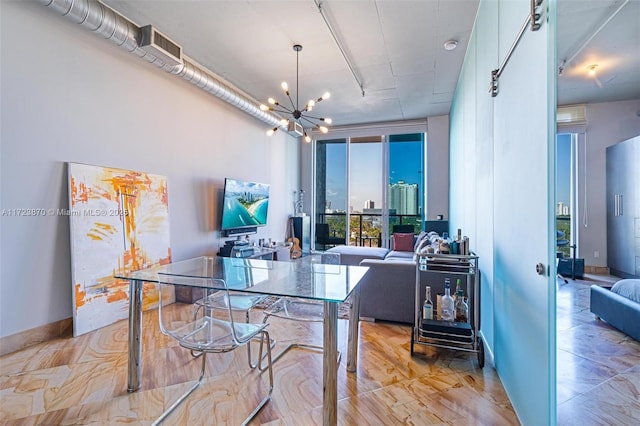 office featuring an inviting chandelier and floor to ceiling windows