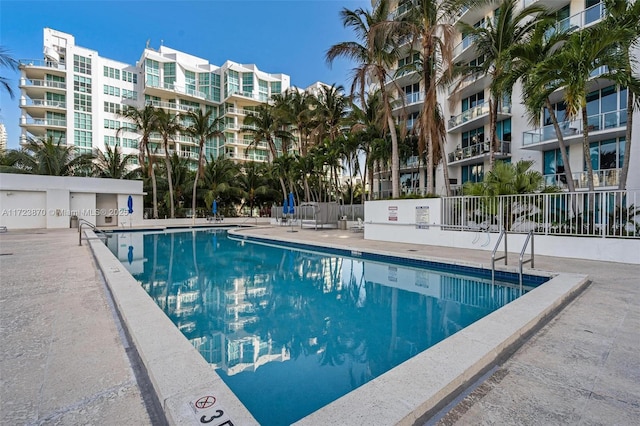 view of pool featuring a patio