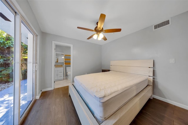 bedroom with access to outside, connected bathroom, ceiling fan, and dark hardwood / wood-style flooring