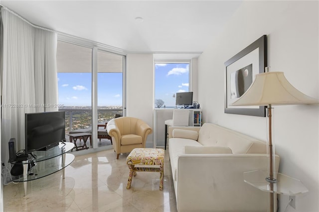 living room featuring a wall of windows and a wealth of natural light