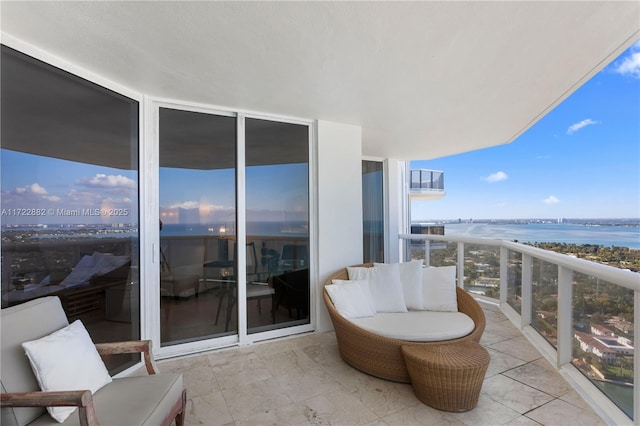 balcony featuring a water view