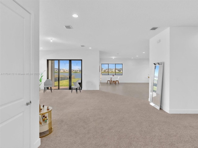 empty room featuring light colored carpet