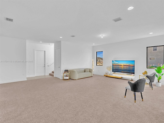 living room with light colored carpet