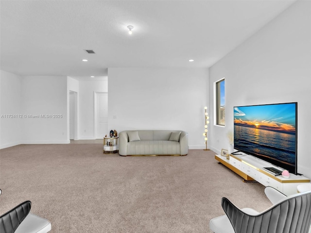 living room featuring light colored carpet