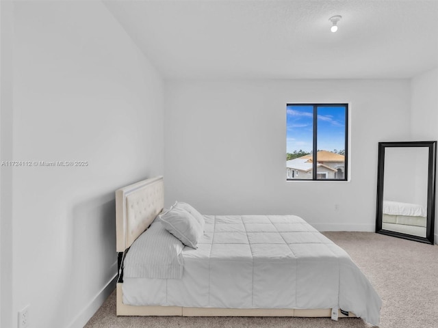 bedroom featuring carpet flooring