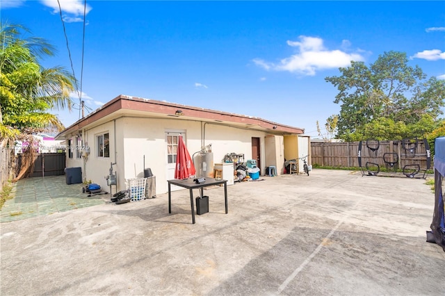 back of house featuring a patio area