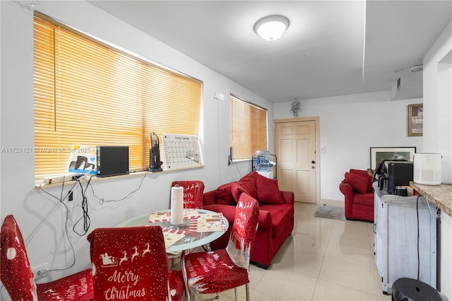 living room with light tile patterned flooring