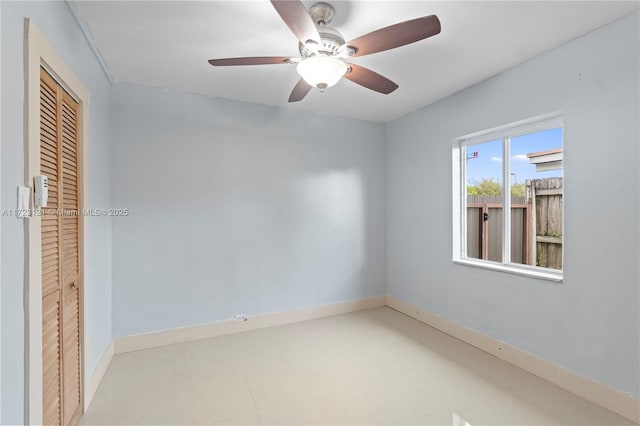 unfurnished room with ceiling fan