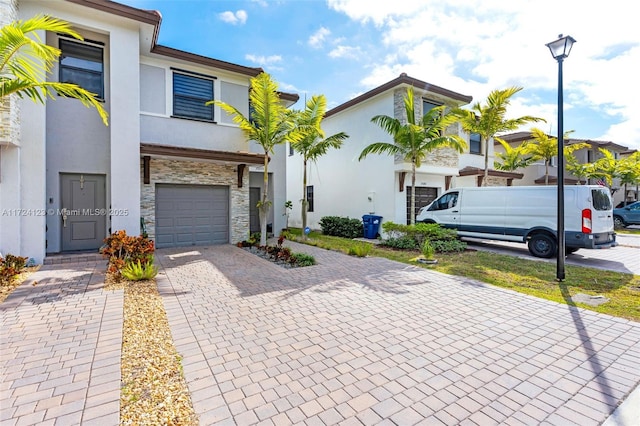 view of front of property with a garage