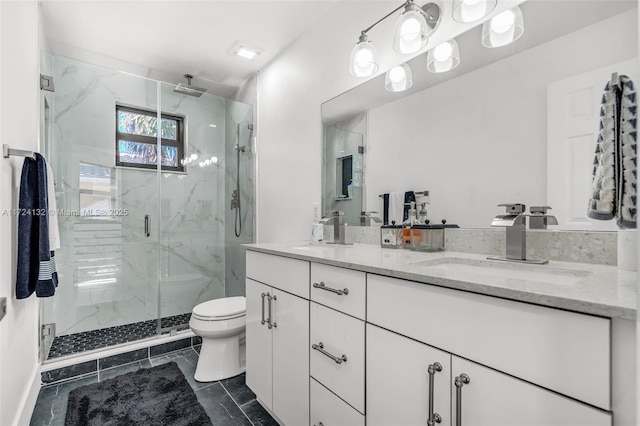 bathroom featuring tile patterned floors, toilet, an enclosed shower, and vanity