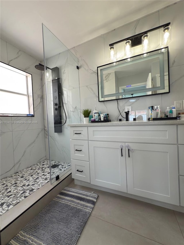 bathroom with vanity and an enclosed shower