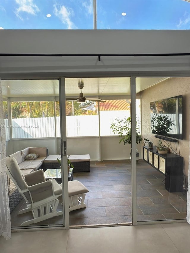 sunroom / solarium with plenty of natural light